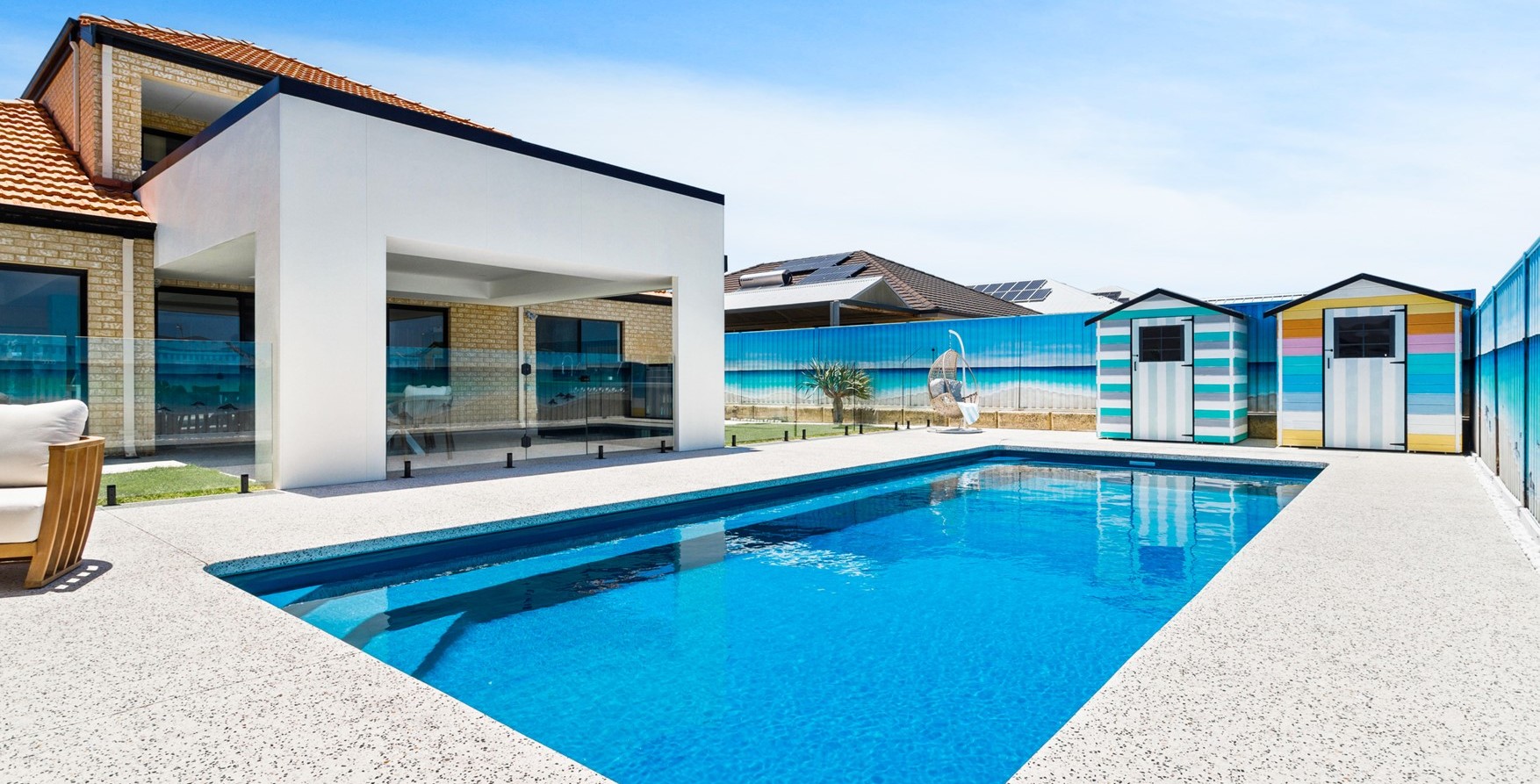 Brampton fibreglass pool with glass fencing