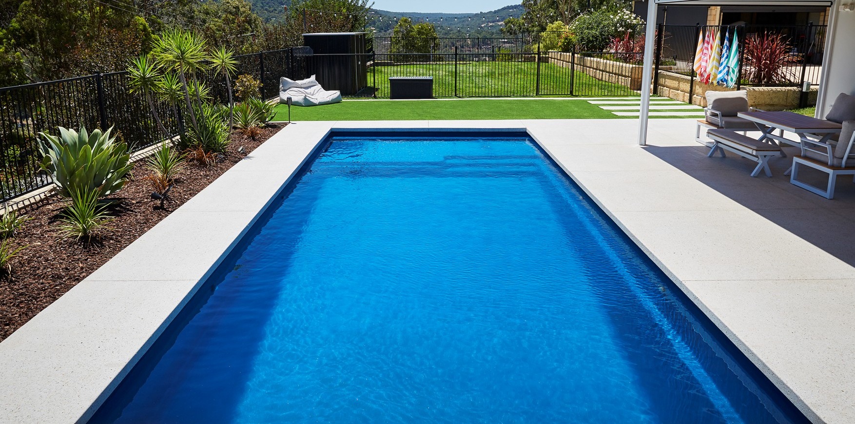 Sunseeker pool in a landscaped backyard